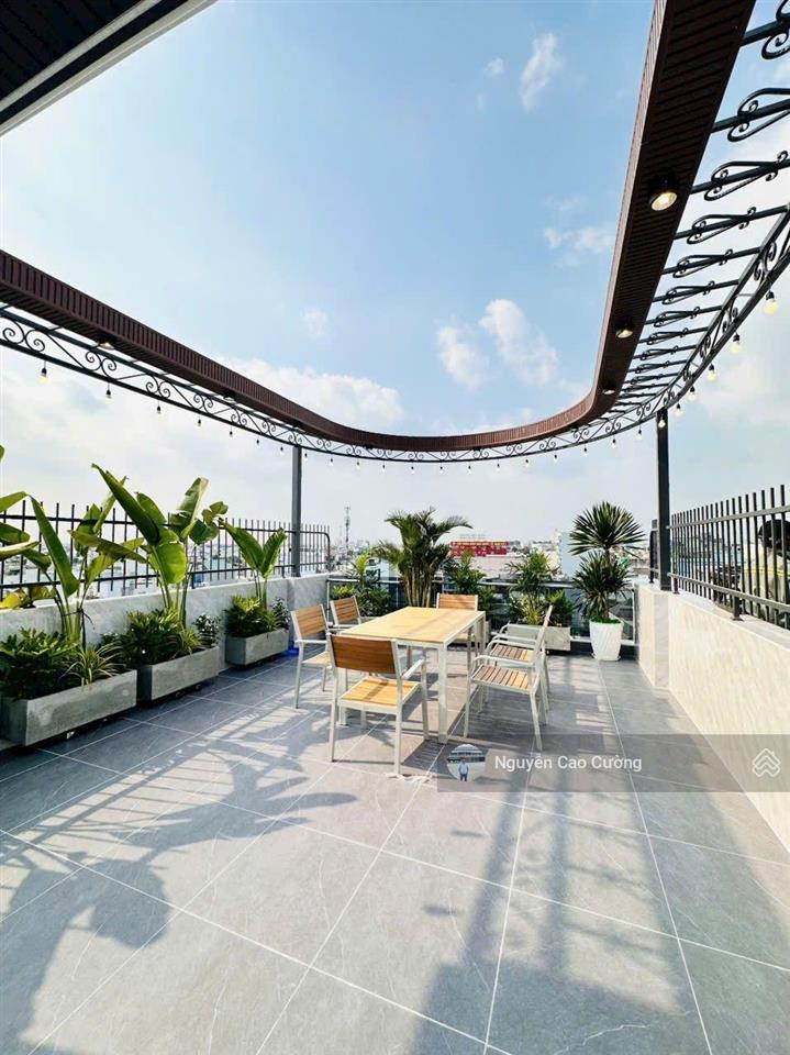 Nhà mặt tiền 5x20m thang máy 650kg, 1lững 5 lầu đường 10m thông, tân thới nhất 02 gần phan văn hớn