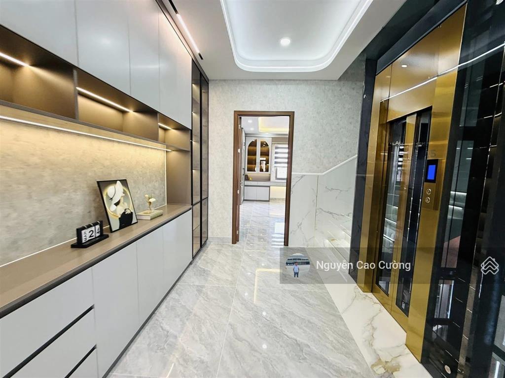 Nhà mặt tiền 5x20m thang máy 650kg, 1lững 5 lầu đường 10m thông, tân thới nhất 02 gần phan văn hớn