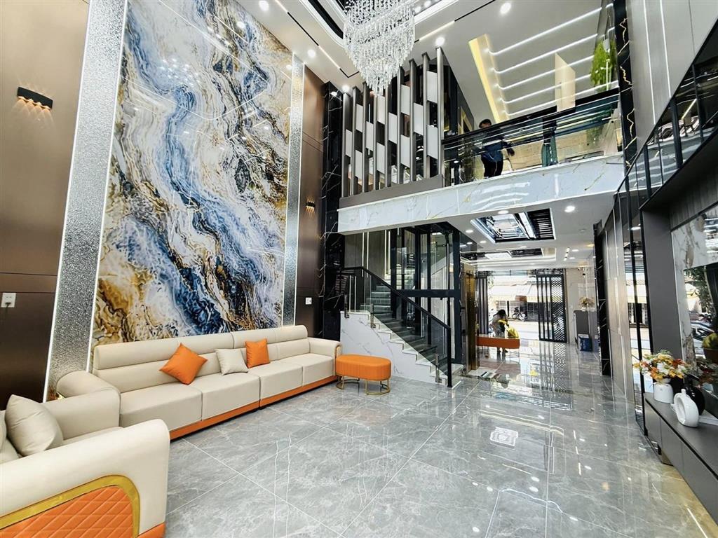 Nhà mặt tiền 5x20m thang máy 650kg, 1lững 5 lầu đường 10m thông, tân thới nhất 02 gần phan văn hớn