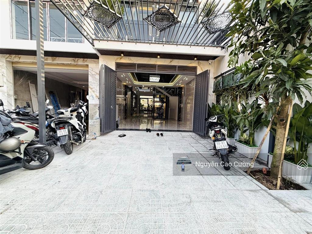 Nhà mặt tiền 5x20m thang máy 650kg, 1lững 5 lầu đường 10m thông, tân thới nhất 02 gần phan văn hớn