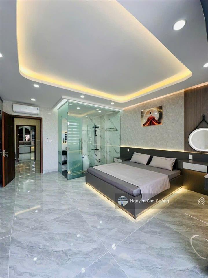 Nhà mặt tiền 5x20m thang máy 650kg, 1lững 5 lầu đường 10m thông, tân thới nhất 02 gần phan văn hớn