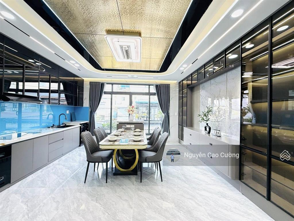 Nhà mặt tiền 5x20m thang máy 650kg, 1lững 5 lầu đường 10m thông, tân thới nhất 02 gần phan văn hớn