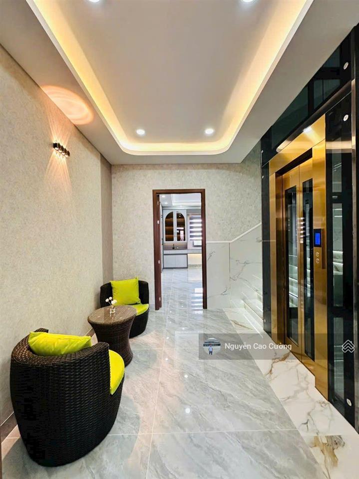 Nhà mặt tiền 5x20m thang máy 650kg, 1lững 5 lầu đường 10m thông, tân thới nhất 02 gần phan văn hớn