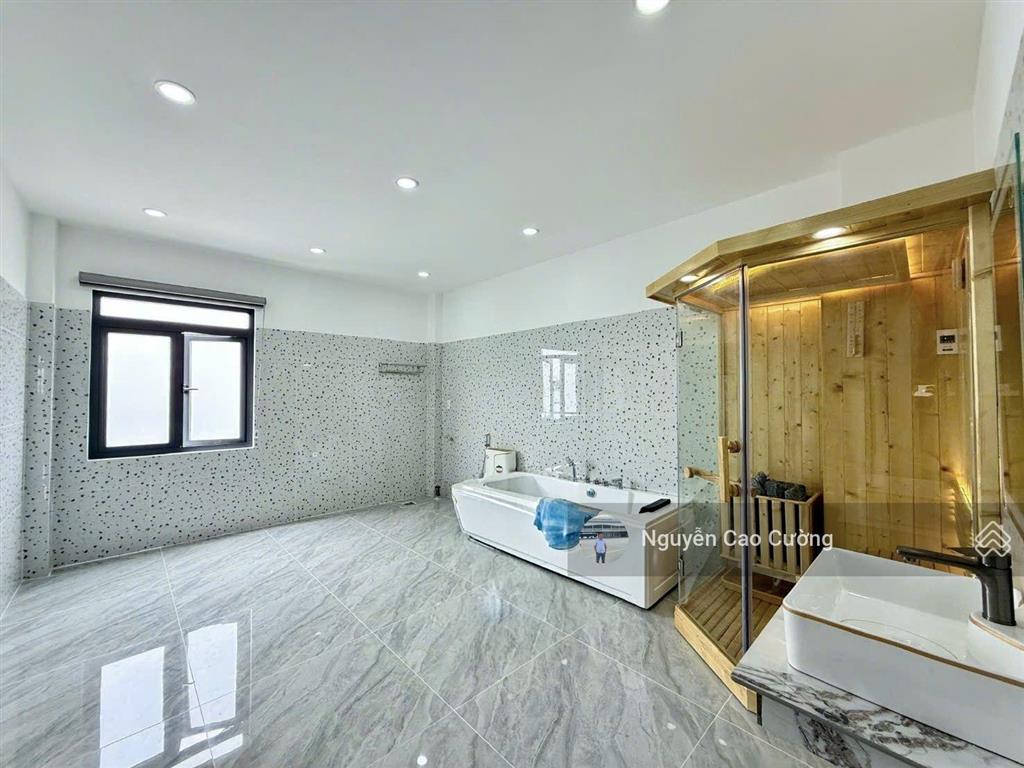 Nhà phố thang máy 4x16m đúc 1 lửng 3 lầu đường 14m điện nước âm khu đồng bộ thới an 16, p. thới an