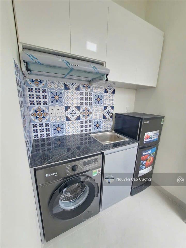 Bán căn hộ dịch vụ thang máy 5x20m 1hầm 4 lầu 12phòng có thang máy đường 8m trần thị hè, hiệp thành