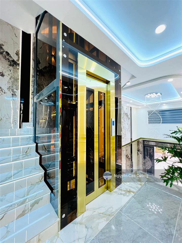 Bán nhà thang máy 4x16m 1lững 3 lầu đường 8m thông trung mỹ tây 2a