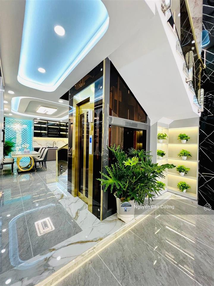 Bán nhà thang máy 4x16m 1lững 3 lầu đường 8m thông trung mỹ tây 2a