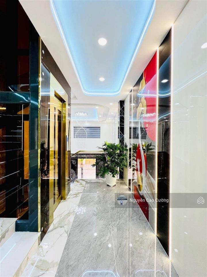 Bán nhà thang máy 4x16m 1lững 3 lầu đường 8m thông trung mỹ tây 2a
