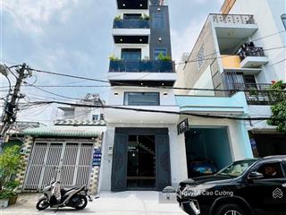 Bán nhà thang máy 4x16m 1lững 3 lầu đường 8m thông trung mỹ tây 2a