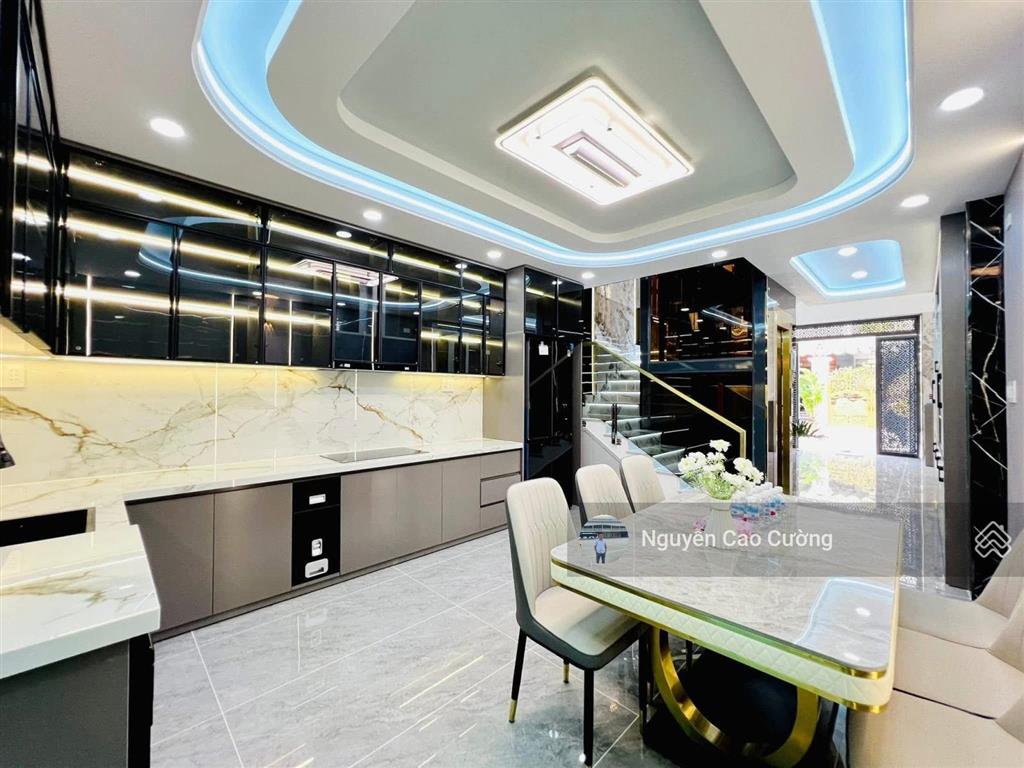 Bán nhà thang máy 4x16m 1lững 3 lầu đường 8m thông trung mỹ tây 2a