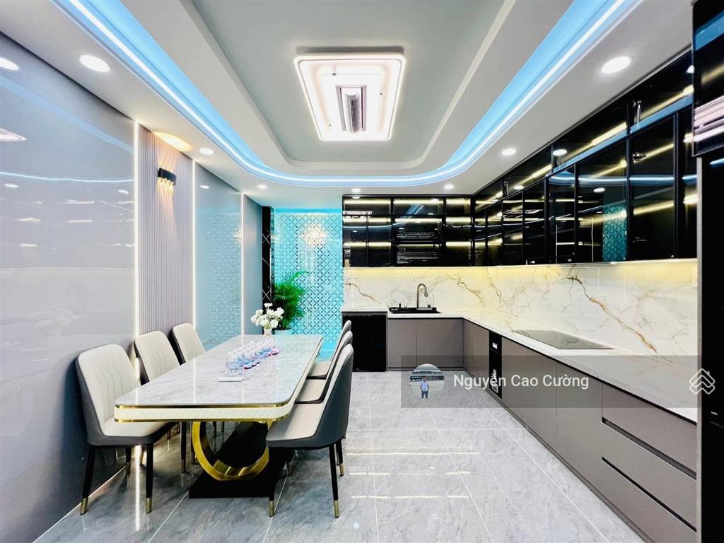 Bán nhà thang máy 4x16m 1lững 3 lầu đường 8m thông trung mỹ tây 2a