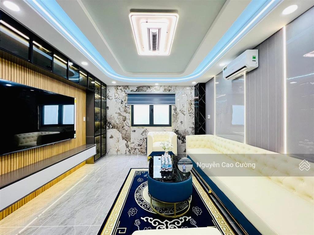 Bán nhà thang máy 4x16m 1lững 3 lầu đường 8m thông trung mỹ tây 2a