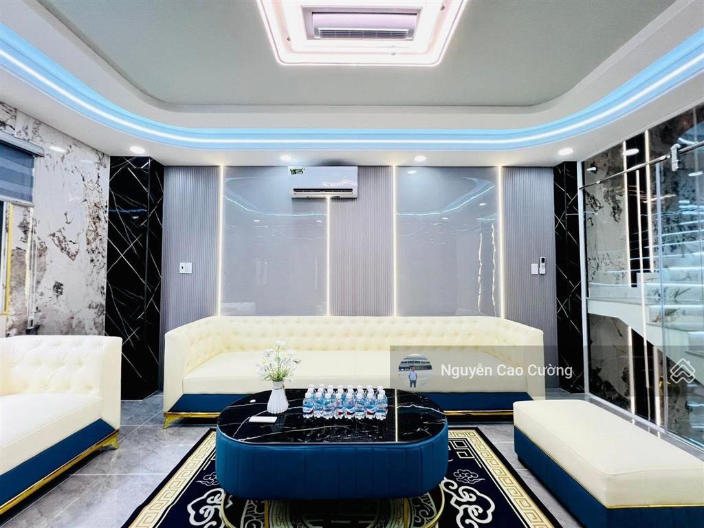 Bán nhà thang máy 4x16m 1lững 3 lầu đường 8m thông trung mỹ tây 2a