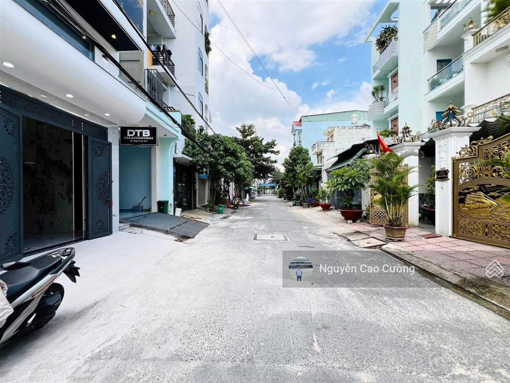 Bán nhà thang máy 4x16m 1lững 3 lầu đường 8m thông trung mỹ tây 2a