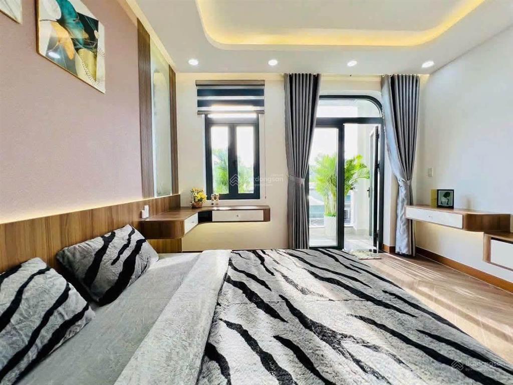 Siêu phẩm nhà phố mặt tiền thang máy 650kg, 4.2x25m đúc 6 tầng đông hưng thuận 22  nguyễn văn quá