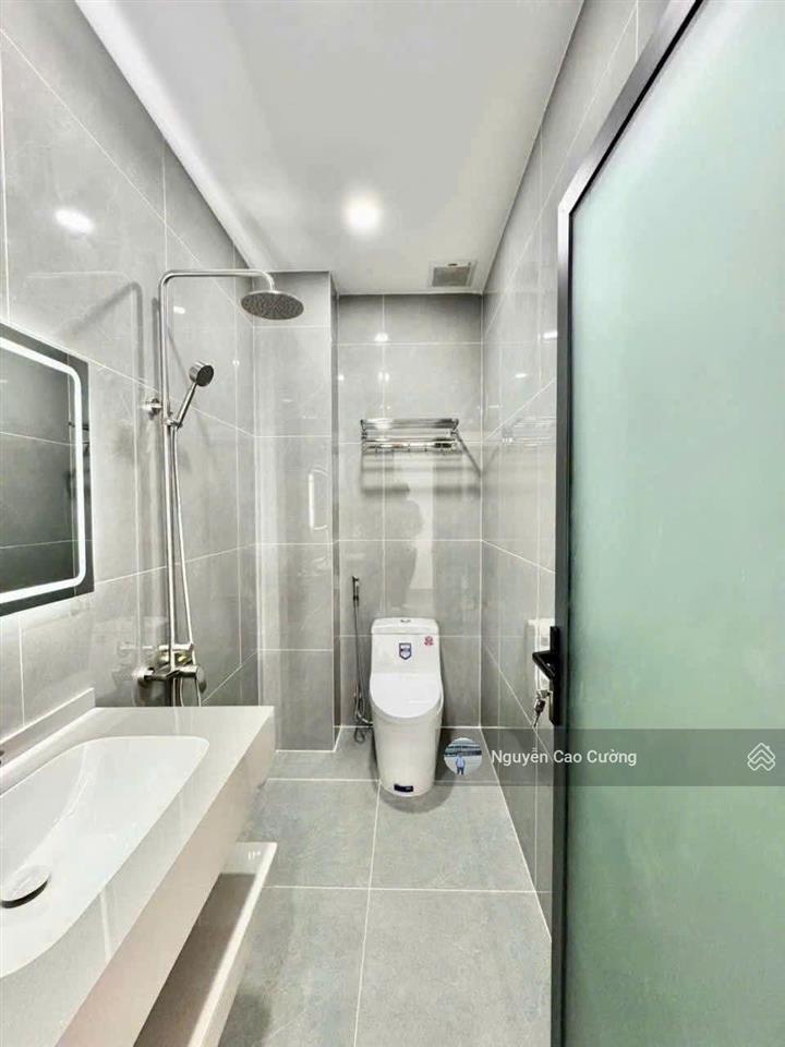 Nhà mặt tiền thang máy 4x22m 1 lửng 3 lầu đường 8m thông khu đồng bộ cao cấp thới an 05, q12