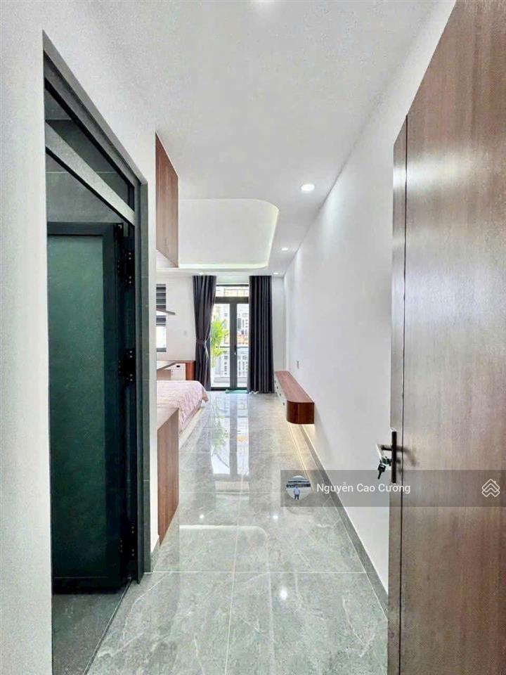 Nhà mặt tiền thang máy 4x22m 1 lửng 3 lầu đường 8m thông khu đồng bộ cao cấp thới an 05, q12