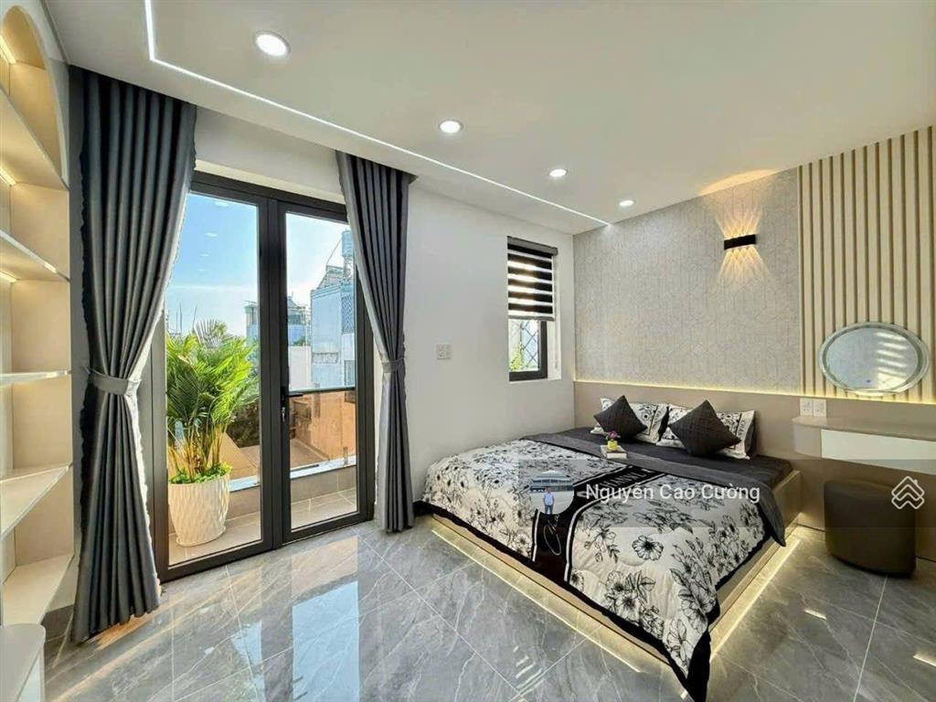 Siêu phẩm thang máy 4.5x18m 1 lửng 3 lầu sát bên mầm non sơn ca 5, tân chánh hiệp 17 thông ra tch10