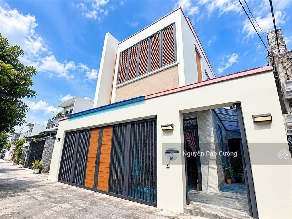 Nhà phố ngang 6.1m phong cách màu hồng cực chất đường 5m xe hơi nguyễn văn quá (tth29) gần chợ