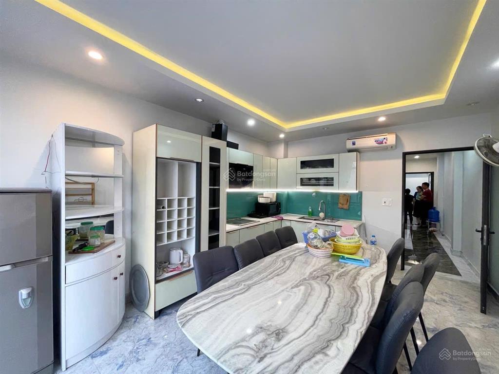 Nhà 5 tầng thang máy lô 22 lê hồng phong  60m2  đông bắc