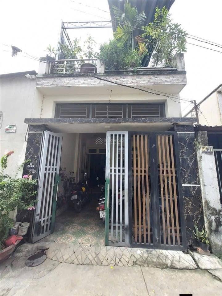 Bán nhà trệt lầu  nở hậu gần chợ xóm vắng , dĩ an