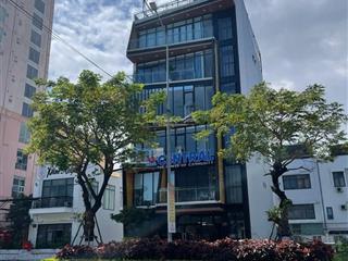 Tòa nhà văn phòng trần hưng đạo, sơn trà view sông hàn, dt 200m2, 6 tầng 1 tum dòng tiền 165tr/th