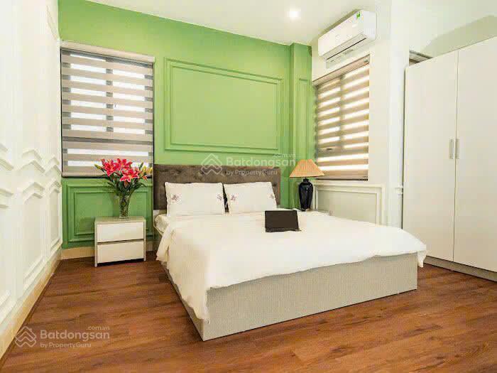 Bán gấp nhà mặt phố dt 61m xây 9 tầng giá 22 tỷ đang kinh doanh làm khách sạn tại triều khúc