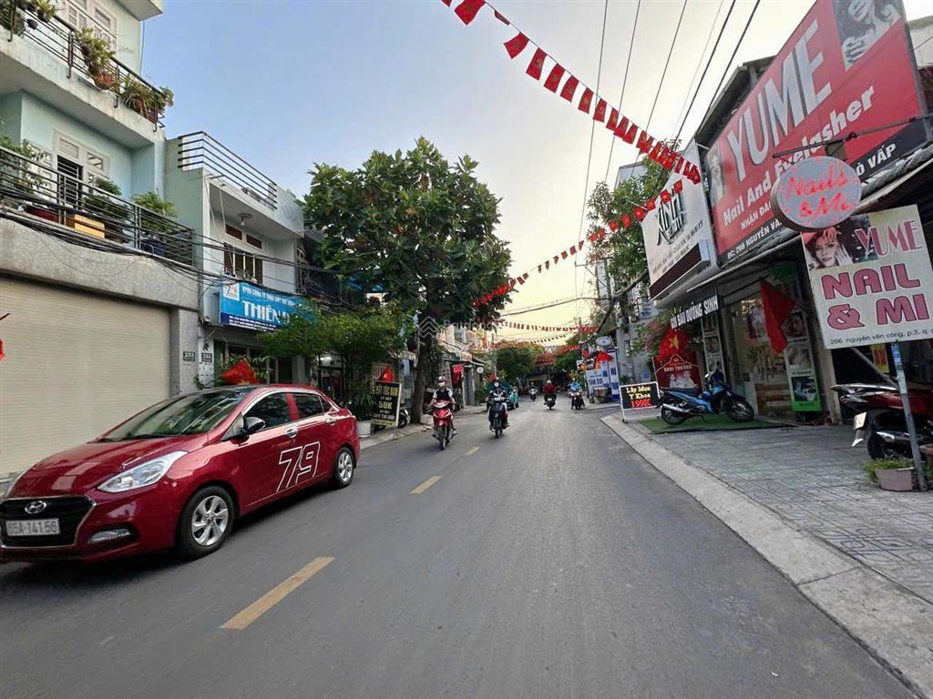 Bán nhà đẹp 4 tầng mtkd nguyễn văn công ngang 4.5m 77m2 vài phút tới sân bay chỉ 11.5 tỷ.