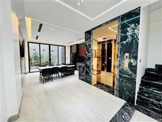 Bán gấp nhà 30 Nguyễn Thị Định - Cầu Giấy, dt 90m2 x 8T thang máy, gara ô tô, lh ngay: 0988138345