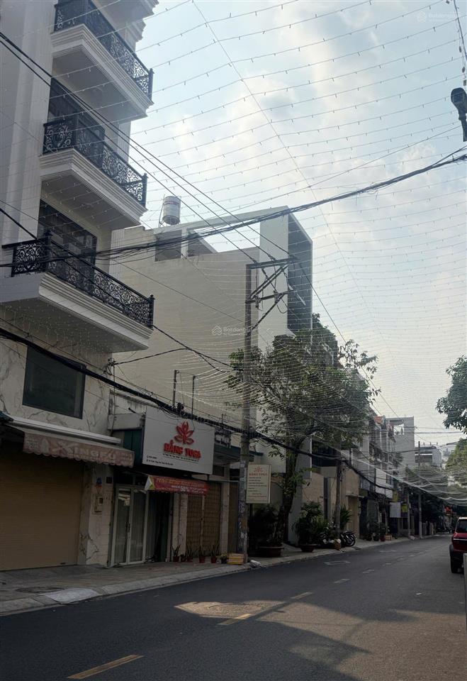 Ngay kênh tân hoá trịnh đình trọng, 5tầng st, thang máy, 90m2 n.4,2m vuông nở hậu, đường 8m thông