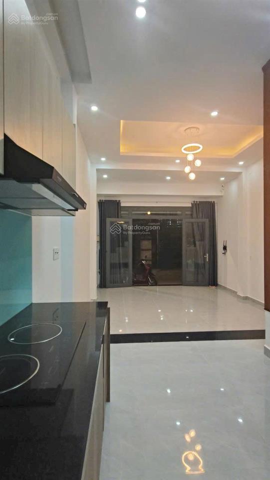 Nhà mơi xây trệt 3 lầu 4,5x10m có 3pn 3wc xe hơi ngủ trong nhà phan huy ích p12 gv