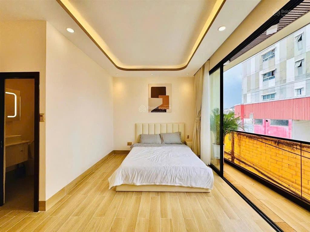Trệt lửng 4 lầu 5,5x16m gồm 10pn 9wc có thang máy full nội thất phạm văn chiêu gò vấp