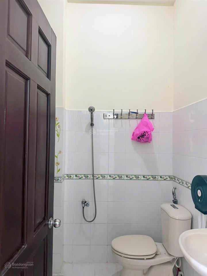 Trệt 2 lầu sân thượng 4x16m 3pn 3wc xe hơi ngủ trong nhà đường 8m gần chợ an nhơn