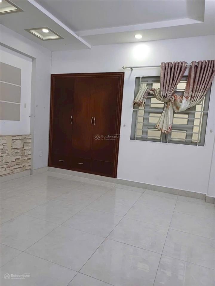 Nhà gần chợ an nhơn 4x18m trệt 3 lầu có 4pn 5wc hẻm xe hơi giá 18 triệu