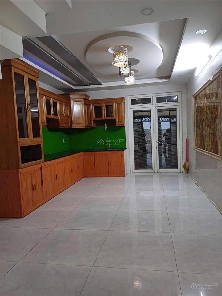 Nhà gần chợ an nhơn 4x18m trệt 3 lầu có 4pn 5wc hẻm xe hơi giá 18 triệu
