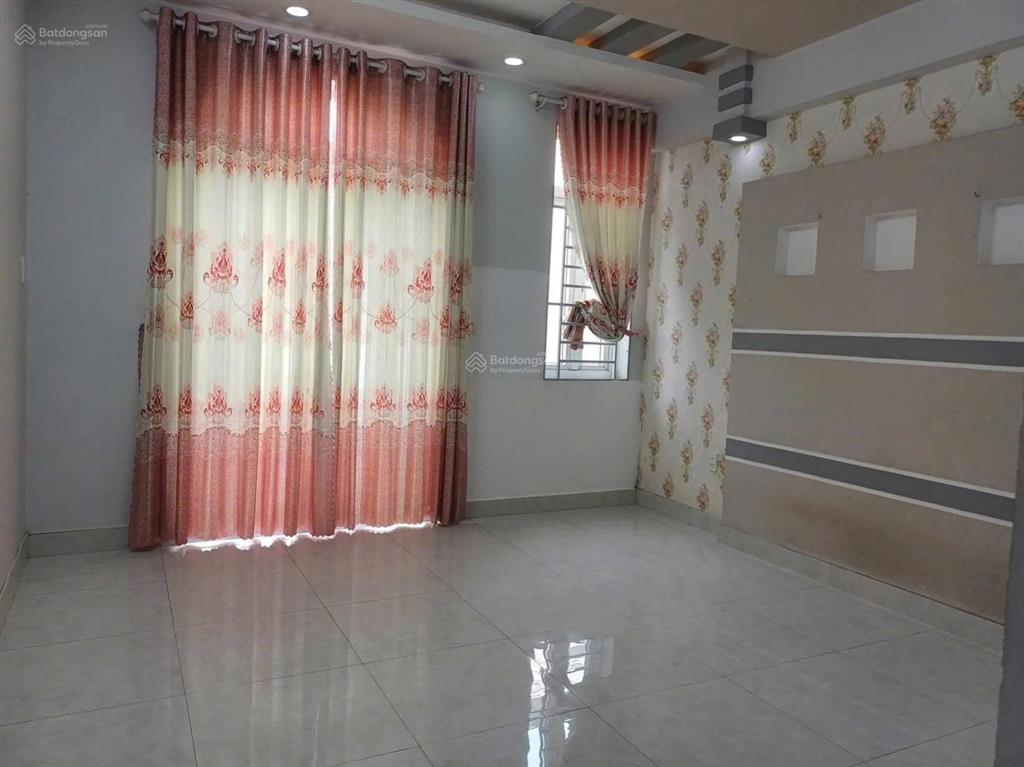 Nhà gần chợ an nhơn 4x18m trệt 3 lầu có 4pn 5wc hẻm xe hơi giá 18 triệu