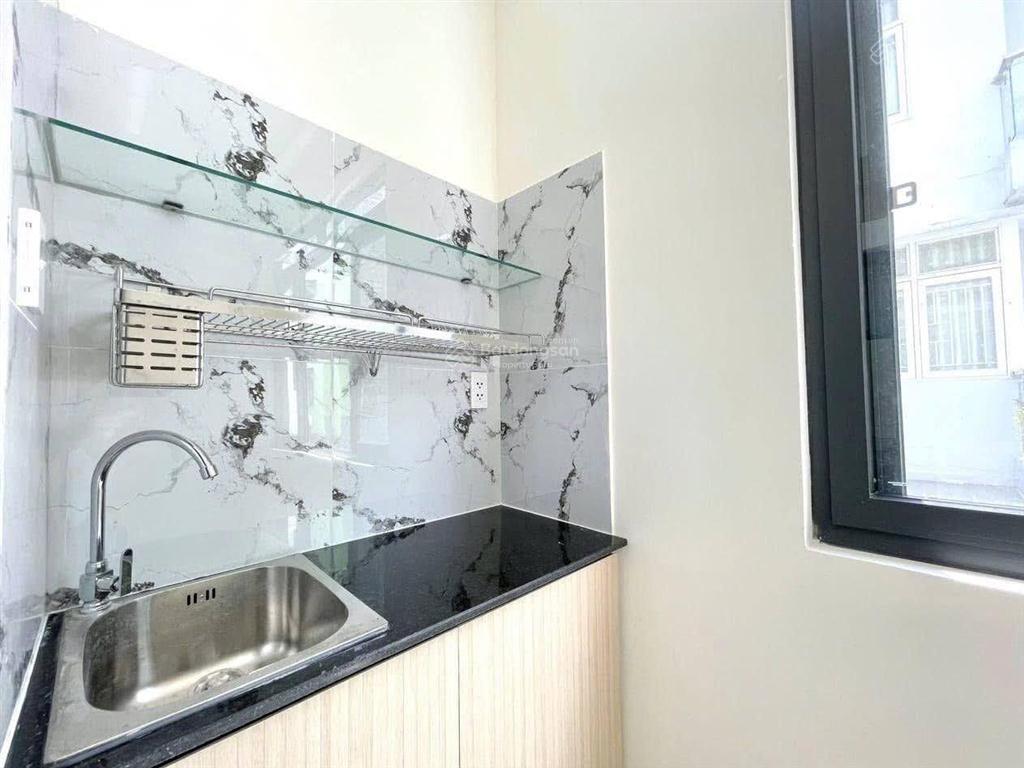 Bán nhà bùi đình túy 4x20 3 lầu 13 phòng cao cấp cho thuê
