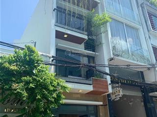 Xe hơi ngủ trong nhà bán nhà nguyễn xí, 4x15m, 2 lầu sát mặt tiền đường