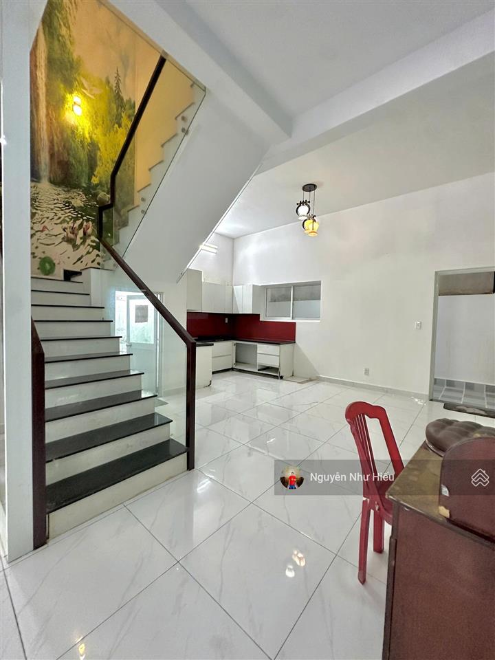 Bán nhà 1 trệt 1 lầu đường trục chính kdc champaca garden, p. đông hòa, tp. dĩ an