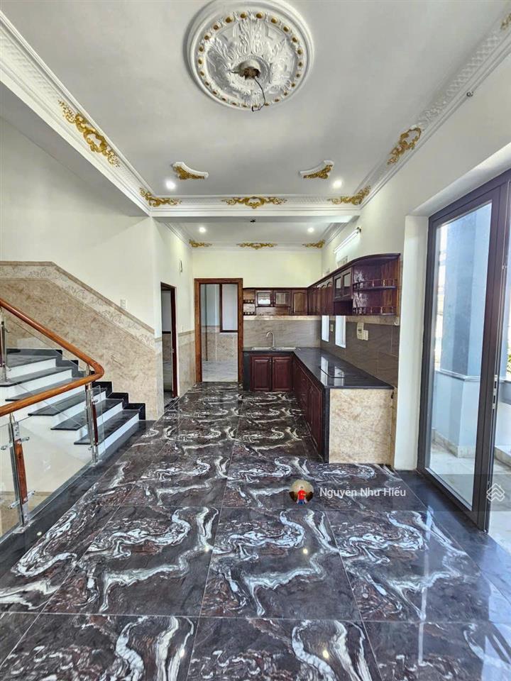 Bán nhà 1 trệt 1 lầu 1 lửng góc 2 mặt tiền mt đường cây da p. tân bình tp. dĩ an