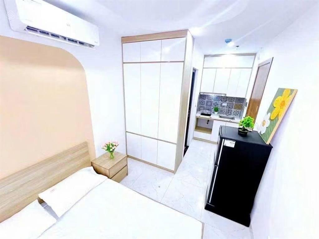 Hoàng văn thái tòa căn hộ dịch vụ 61m x 7 tầng. mt 5.6m. tổng 16p khép kín. dòng tiền 1.2 tỷ/năm.