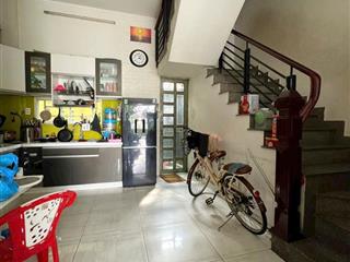 Nhà 4 tầng nở hậu L mặt tiền view bờ kè Lò Gốm P12Q6. Giá: 8.4 tỷ