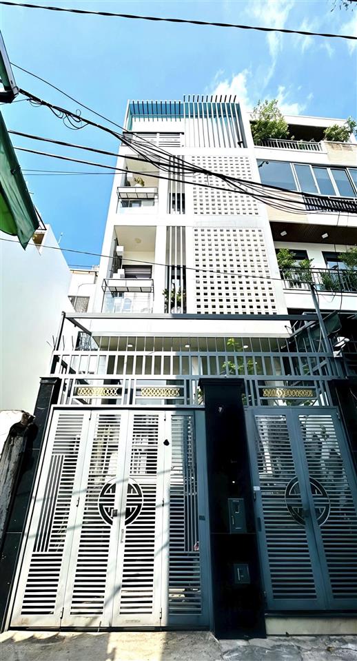 Bán nhà mới 5 tầng khu him lam kiều đàm ô tô vào nhà có hầm ngang 5x15m chỉ 13,5 tỷ tl tt quận 7