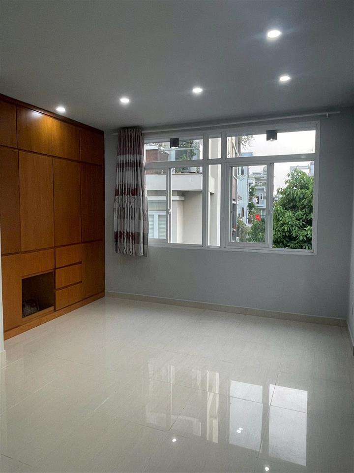 Bán nhà góc 2 mt hxh hồ biểu chánh phú nhuận, dt 5x8,15m, 4 tầng, giá chỉ 8 tỷ 7 tl