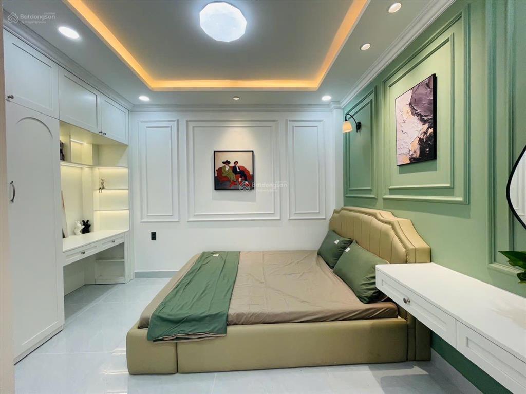 Bán nhà mới đẹp hxh phan đăng lưu, dt 4x10m, 4 tầng st, 5 pn, 6wc, full nội thất, giá 10,7 tỷ tl