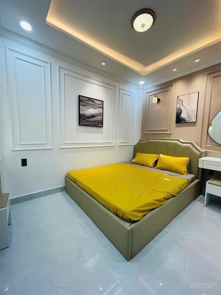 Bán nhà mới đẹp hxh phan đăng lưu, dt 4x10m, 4 tầng st, 5 pn, 6wc, full nội thất, giá 10,7 tỷ tl