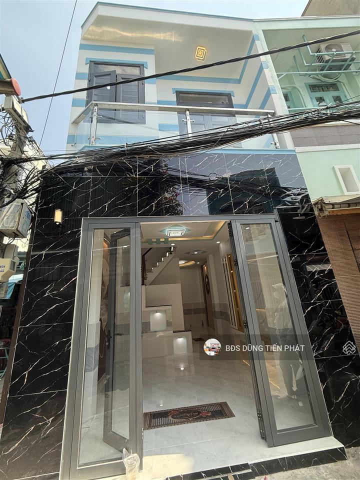 Nhà mới 1 lửng lầu 3 pn hẻm 6m lương văn căn p15