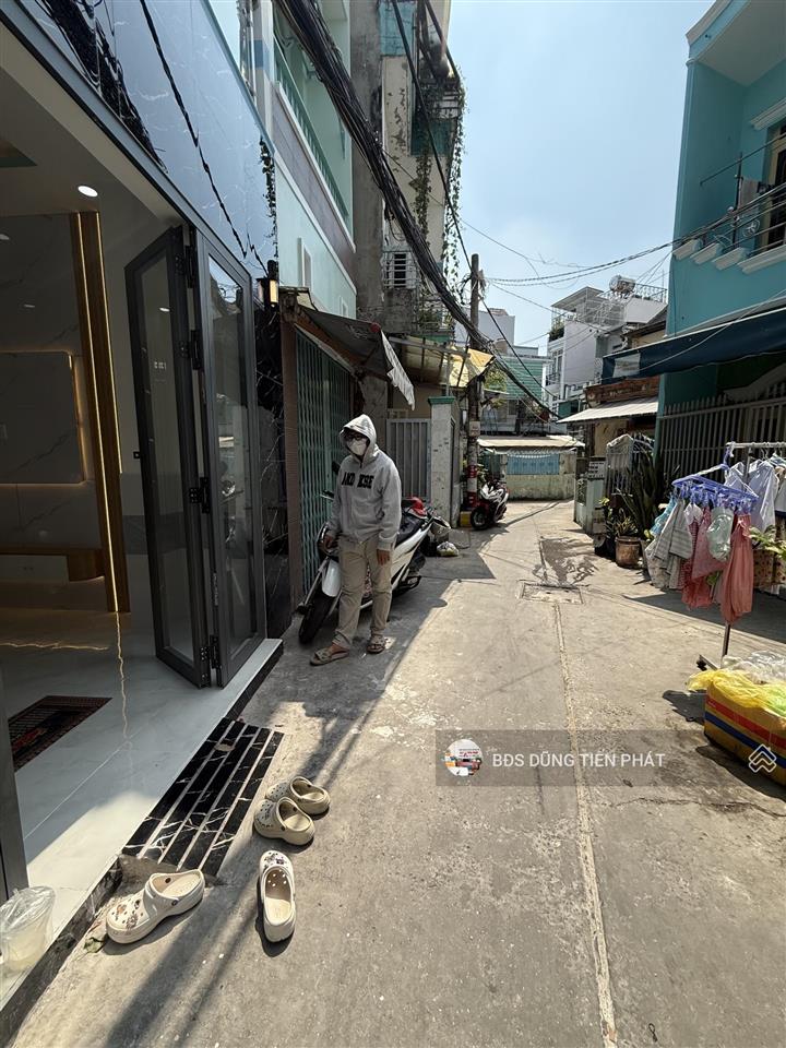 Nhà mới 1 lửng lầu 3 pn hẻm 6m lương văn căn p15
