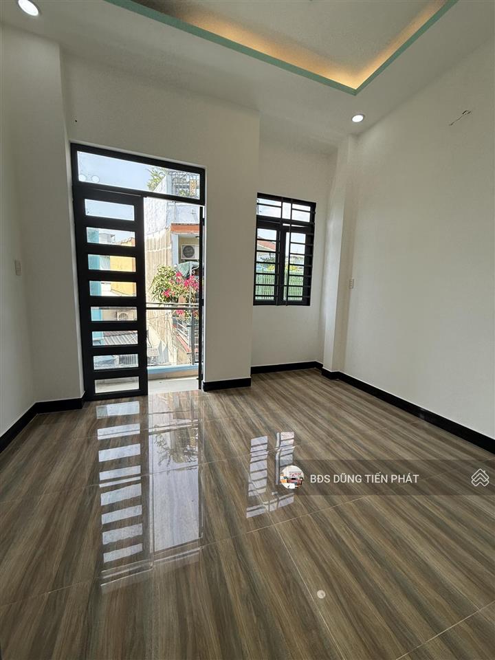 Nhà mới 1 lửng lầu 3 pn hẻm 6m lương văn căn p15