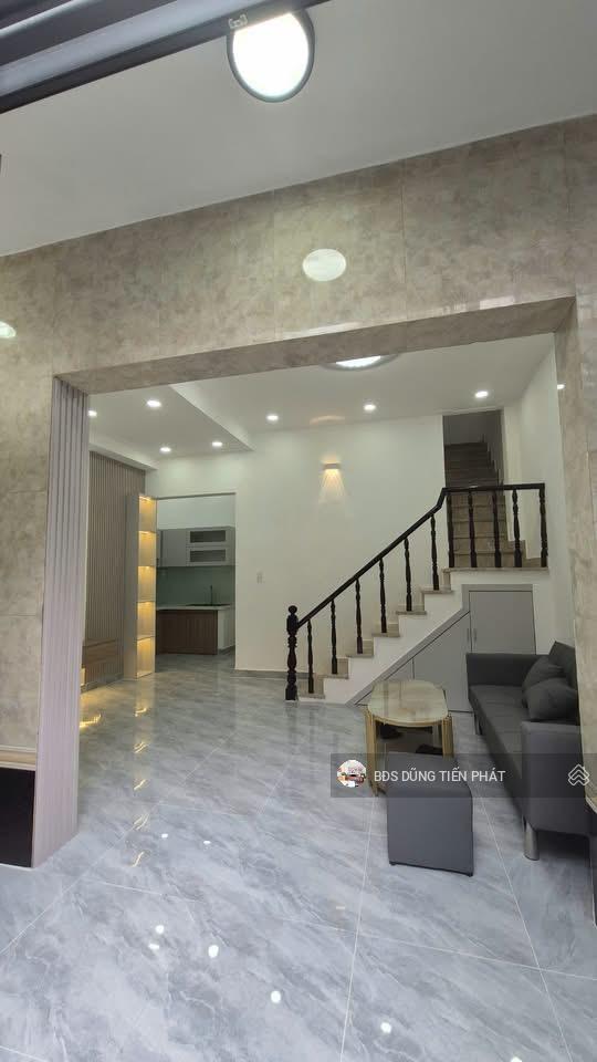 Nhà mới 2 lầu nở hậu nguyễn duy p9 hẻm thông